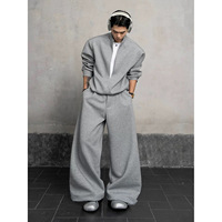 Nouvel ensemble deux pièces tendance pour homme, style coréen, col montant, pull ample et pantalon décontracté, collection Printemps-Automne 2026