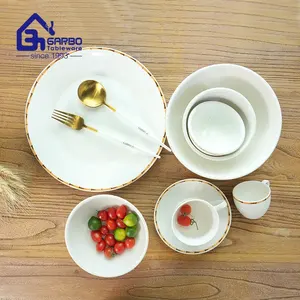 Service de vaisselle moderne en porcelaine blanche avec tasse et soucoupe vaisselle de cuisine quotidienne pour la maison ensemble de 30 pièces en céramique ronde à bande de couleur