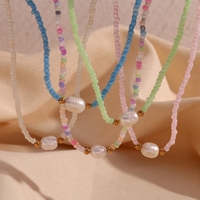 Collier à breloques en acier inoxydable plaqué or OEM Collier ras de cou coloré en perles d'eau douce Sac à chaînes en acier inoxydable