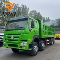 Camion à benne basculante haute capacité Sinotruk 8X4 de 20 à 60 tonnes Camion à usage intensif HOWO Camion à cargaison diesel à 12 roues de bonne qualité Transport d'occasion
