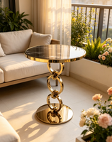 Table d'appoint de luxe italienne à anneaux, plateau en marbre noir et or, table d'appoint artistique pour salon de villa