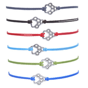 Bracelet en cordon ciré tressé avec empreintes de pattes de chat et de chien, accessoire minimaliste et polyvalent pour femme, best-seller - Product Image 1