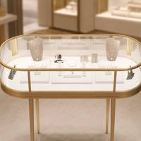 Table de présentation ovale en métal doré avec vitrine en verre trempé, comptoir de luxe pour bijouterie, pour l'affichage de colliers, bagues et boucles d'oreilles