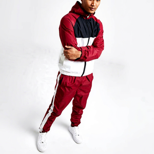 Men Red Color Blocking Tracksuit Full <b>Zip</b> <b>Hooded</b> Sporty Style Lightweight Polyester Regular Fit Side Pockets Spring Wear - Product Image 1