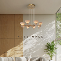 Lustre conique en marbre espagnol intemporel |   Luminaire LED circulaire en laiton pour les zones de restauration
