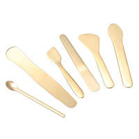 2025 nouvelle bonne qualité 304 acier inoxydable personnaliser Logo métal cosmétique cuillère spatule crème pour les yeux rouleau applicateur cuillère pour le visage