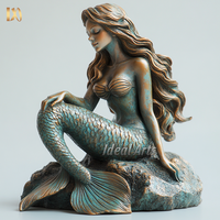 Statue de sirène en bronze grandeur nature réaliste pour la décoration de piscine extérieure