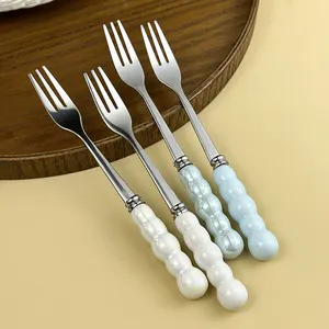 高品质珍珠甜点叉勺套装陶瓷手柄白色餐具不锈钢叉勺套装