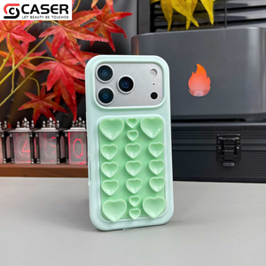 Custodia per <span class=keywords><strong>iPhone</strong></span> 17/16/15/14 in silicone liquido anti-stress con ventosa a <span class=keywords><strong>cuore</strong></span> 3D, effetto pelle, antiurto, colore puro - Product Image 5