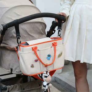 Bolsa Multifuncional para Colgar en el Coche del Bebé con Porta Biberones Impermeable y Aislante - Product Image 1