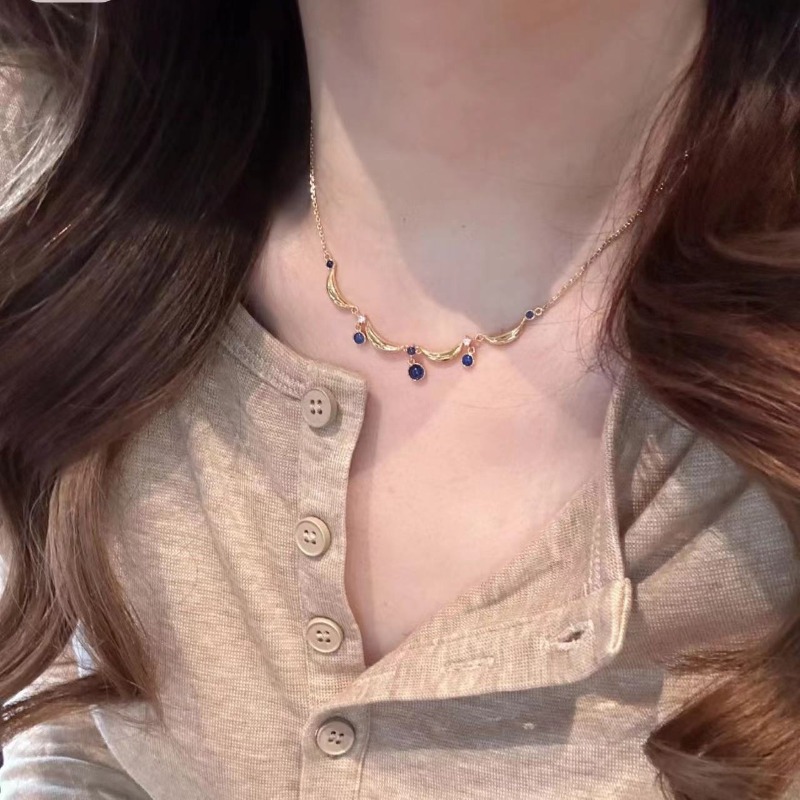 Collier bleu doré