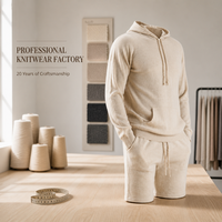 Ensemble de survêtement tricoté pour homme, personnalisé en usine, design OEM, style décontracté pour la maison, comprenant un sweat à capuche et un short, couleur unie simple