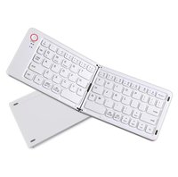 Keyboard Bluetooth portabel, tipis dan ringan, nirkabel mini lipat dua sistem umum untuk berbagai sistem