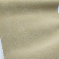Tissu en fausse fourrure de mouton douce, embossé PU, imperméable, matière chaude, moelleuse et confortable pour vêtements d'hiver