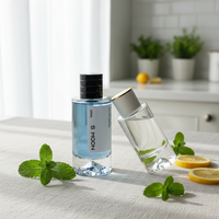 Flacon pulvérisateur de parfum cylindrique transparent en verre de 30 ml/50 ml avec fond en forme de montagne, couleur personnalisée, logo, sans diffuseur à bâtonnets