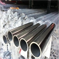 Tube en acier inoxydable ASTM ERW 304/316/316Ti finition brossée, services de cintrage et de découpe pour balustrades en verre de balcon et rampes d'escalier
