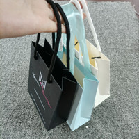 Sacs en papier d'emballage de luxe noirs pour chaussures et vêtements, imprimés avec logo personnalisé, pour le shopping, les cadeaux et les bijoux