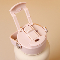 Nouvelle bouteille d'eau à double usage 2 boissons dans une bouteille d'eau en acier inoxydable avec manchon en silicone