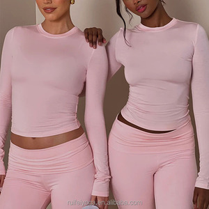 Conjunto de <span class=keywords><strong>2</strong></span> piezas de ropa de dormir con logotipo personalizado, conjunto básico de pantalones de yoga acampanados y Top corto de manga larga Rosa liso para mujer de talla grande - Product Image 1
