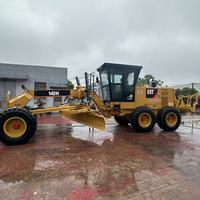 Niveleuse Caterpillar 140H d'occasion à prix abordable avec moteur, pompe et boîte de vitesses, faible nombre d'heures de travail, modèle 2024