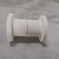 Blocs d'étanchéité en fibre céramique thermoformés avec trous pré-perforés pour la protection de l'entrée des éléments chauffants