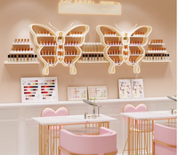 Meuble de salon en fer forgé en forme de papillon, étagère murale pour manucure, support mural en or nano, présentoir pour vernis à ongles