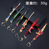Lote de llaveros de metal coloridos con modelo de arma de juego para fans de FPS, decoración para mochilas y coches