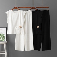 Nouvel ensemble d'été chic : haut tricoté sans manches et pantalon large, ensemble deux pièces tendance pour femme, idéal pour le quotidien, en cachemire.