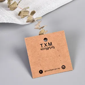 Großhandel mattiertes papier geprägtes goldenes prägen-logo anhänger etiketten etiketten für kleidung