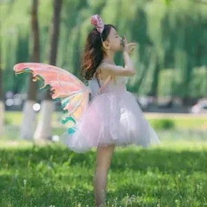 Columpio de mariposa simulado al por mayor, alas de mariposa con luz móvil, alas de mariposa de hadas LED eléctricas para niñas
