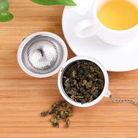 Infuseur à thé réutilisable et écologique en acier inoxydable argent/or 52 mm avec fermoir de verrouillage, filtre à mailles et chaîne portable pour la maison