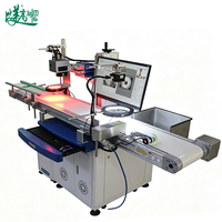 Machine de marquage laser UV automatique pour marquer la date de production et le numéro de lot sur les emballages alimentaires à grande vitesse, les boîtes de chocolat, les boîtes de bonbons et les boîtes en fer.