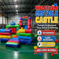 Château gonflable commercial d'extérieur avec toboggan et obstacles, idéal pour les fêtes d'enfants et la location en extérieur