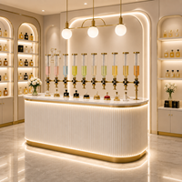 Meubles de magasin de parfums de luxe sur mesure, étagères d'exposition de parfums à LED et vitrines, solution clé en main pour l'aménagement de boutique
