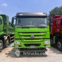 Б/у самосвал SINOTRUK HOWO 8X4 с левым рулем, дизельный, МКПП, двигатель Weichai, Евро-2, грузоподъемность 41-50 т