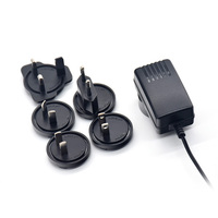 Chargeur de bureau interchangeable 12V 1.5A avec prise DC standard britannique, protection OVP/OTP/SCP, 18W CC-CV pour éclairage LED et usage médical