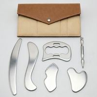 Ensemble de 6 Gua Sha en acier inoxydable avec sac de rangement en feutre, outil de massage pour la relaxation musculaire et les soins de santé