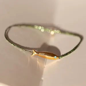 Brass gold plated small fish design crystal rhinestone inlaid charms flashing green color hand rope bracelet boho jewelry