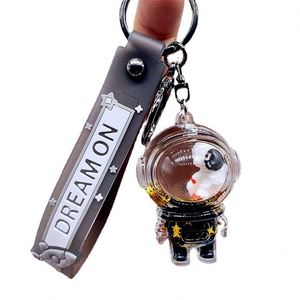 Porte-clés liquide astronaute en gros, design personnalisé, dessin animé mignon, petit cadeau, accessoires de voiture, pendentif de sac - Product Image 1