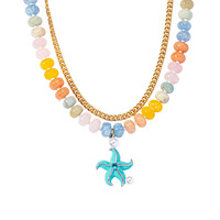 Collier ras du cou tendance pour femme avec pendentif étoile de mer en pierre naturelle et chaîne dorée colorée, idéal pour l'été et la plage