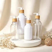 Botol Lotion Plastik Logo Kustom Amber Bening Putih Hitam Isi Ulang untuk Sabun Mandi Sampo 300 ml 500ml dengan Pompa Bambu