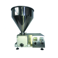 Machine multifonctionnelle pour l'injection de confiture au chocolat et le remplissage de choux à la crème