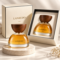 Vente en gros de flacons de parfum en verre transparent semi-circulaires vides de 30 ml, 50 ml et 100 ml, conformes à la réglementation REACH, avec bouchon en bois et boîte cadeau en papier