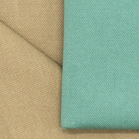 En stock : Tissu sergé dense en coton lavé au sable 40S, couleur kaki, pour la fabrication de vêtements