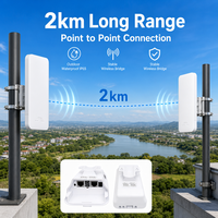 Kit de Pont Sans Fil 2KM Point à Point pour Extérieur : Solution de Réseau pour Magasins, Granges, Garages et Bâtiments