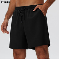 Shorts de football et de fitness 2 en 1 personnalisés avec logo OEM en polyester et élasthanne extensible dans les quatre sens