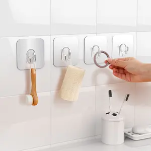 Gancho mágico duradero autoadhesivo transparente perchas adhesivas fuertes para gancho de palo de baño bolsa empaquetada