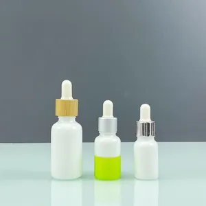 Kozmetik ambalaj altın taban metal opal beyaz uçucu yağ cam damlalıklı şişe şişe serigrafi serum şişesi