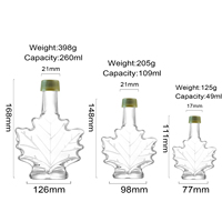 Bouteilles en verre en gros pour sirop d'érable, fabricant de bouteilles de vin en forme de feuille d'érable, 250 ml, 100 ml, 50 ml, petites mini-bouteilles en verre en forme de feuille d'érable