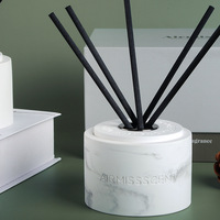 Vente en gros de roseau aromatique béton plâtre peinture chinoise diffuseur rond logo personnalisé boîte cadeau unique bouteille diffuseurs de roseaux